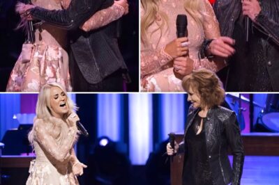 Reba McEntire and Carrie Underwood Create an Unforgettable, Goosebumps-Worthy Moment with a Surprise Duet of “Does He Love You” at the Grand Ole Opry