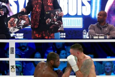 Tension Before the Rematch: Usyk’s Team Exposes Dubois with Over 20 Low Blows, Using Signed Photos to Ignite Controversy