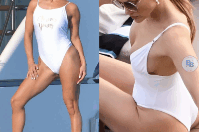 Jennifer Lopez Flashes Skin While Using Her Beauty Products